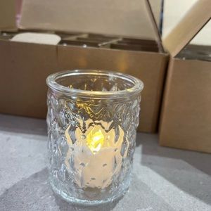 24 clear textured glass votives with flameless tea candle